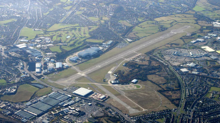 Aerial view of the former Filton Airfield in North Bristol with surrounding houses and businesses